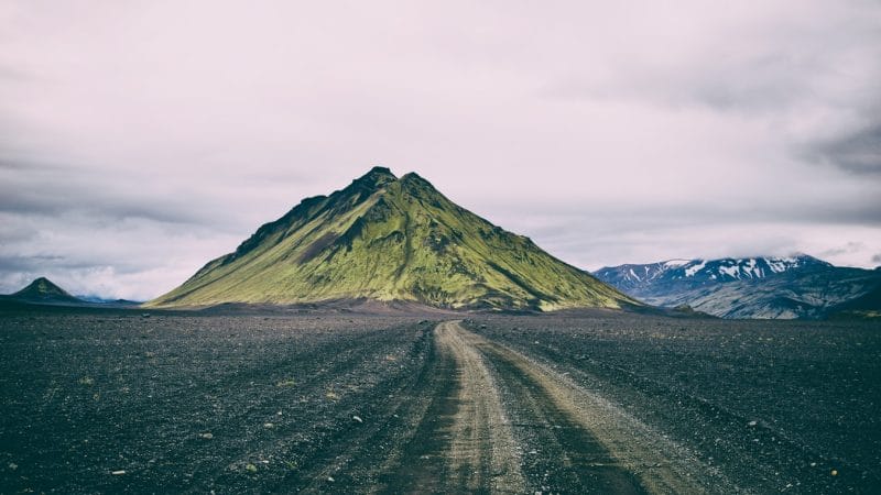 Self Driving road trip next to Mælifell volcano in the Highlands of Icelan