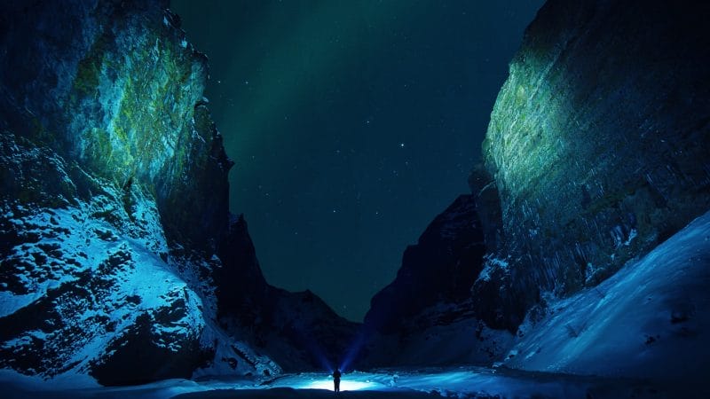 northern lights over Stakkholtsgja canyon during winter, game of thrones location in Iceland